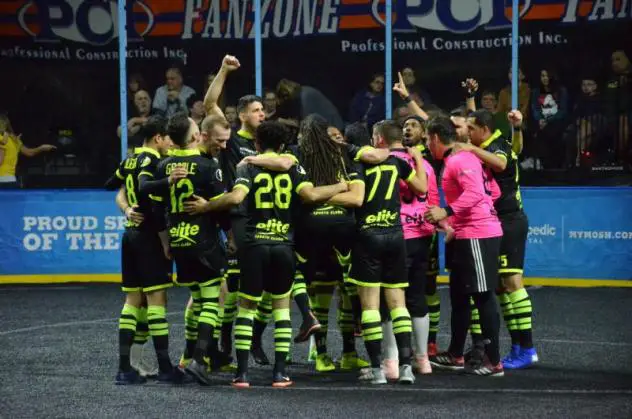 Milwaukee Wave huddle up after eliminating the Kansas City Comets