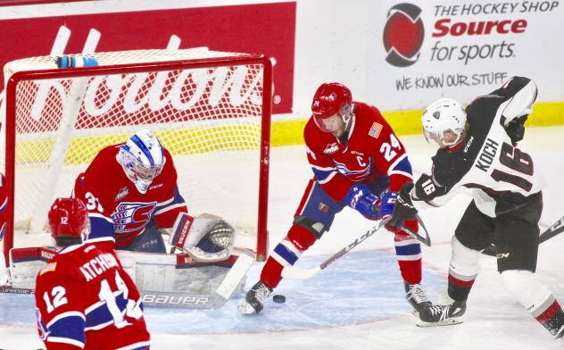 Davis Koch of the Vancouver Giants takes a shot against the Spokane Chiefs