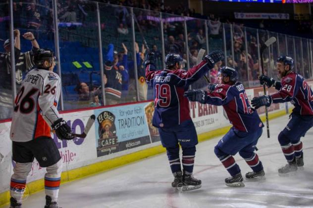 Tulsa Oilers celebrate a goal against the Kansas City Mavericks