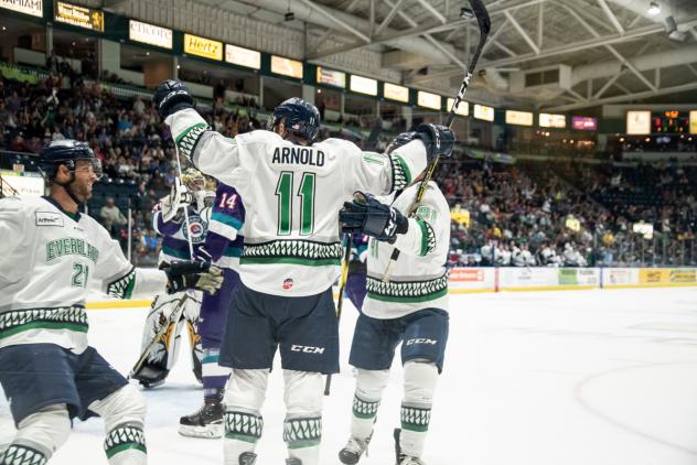 Florida Everblades celebrate against the Orlando Solar Bears