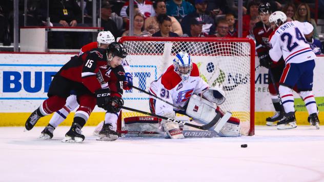 Vancouver Giants right left wing Owen Hardy in front of the Spokane Chiefs net