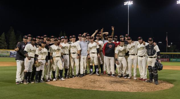 Visalia Rawhide pose after winning 13th straight game