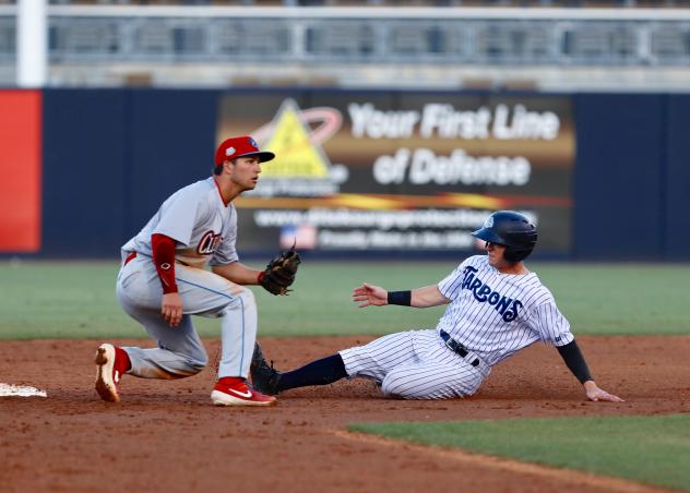 Matt Pita of the Tampa Tarpons slides into second against the Clearwater Threshers
