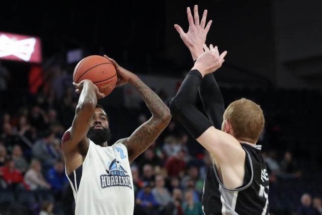 Halifax Hurricanes SG Terry Thomas takes a shot over the Moncton Magic