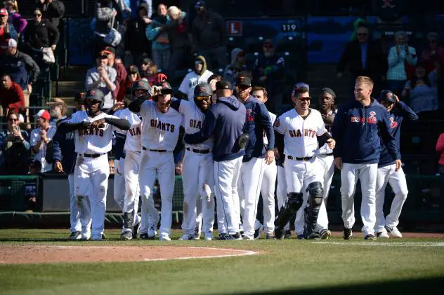 Tacoma Rainiers, playing as the Tacoma Giants, celebrate a walk-off win