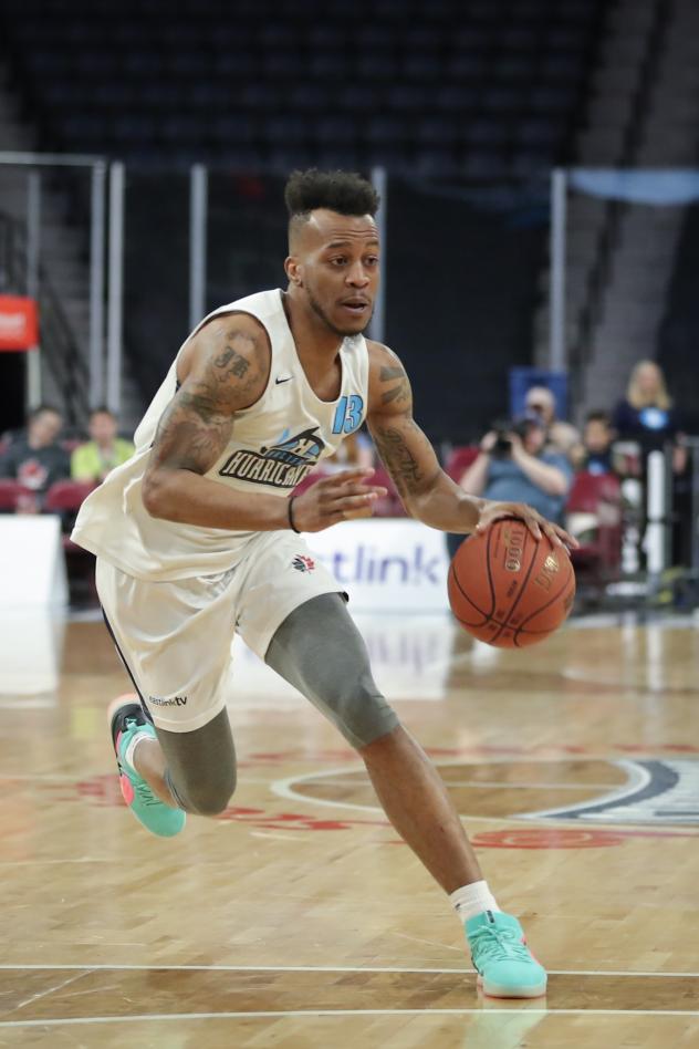 Halifax Hurricanes guard Joel Kindred drives against the Moncton Magic
