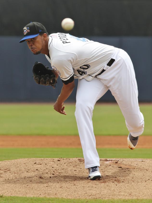 Biloxi Shuckers pitcher Angel Perdomo delivers