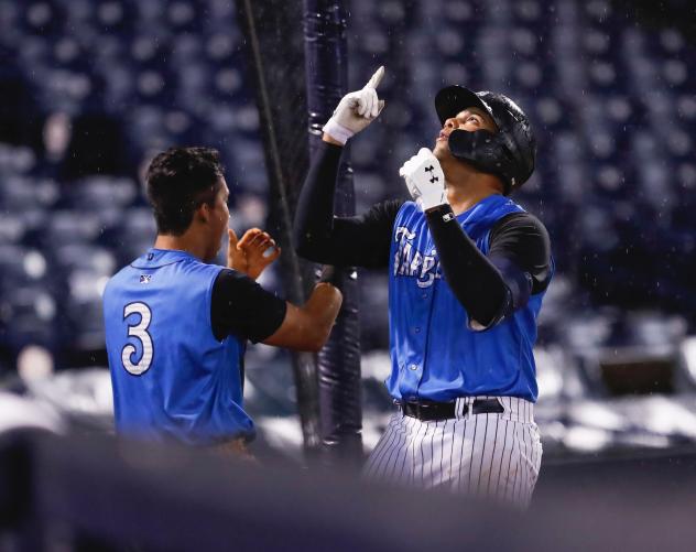 Oswaldo Cabrera and Dermis Garcia of the Tampa Tarpons