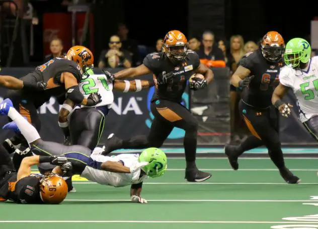 Darrell Monroe of the Arizona Rattlers fights through the Nebraska Danger defense
