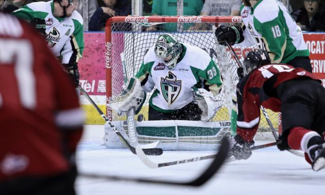 Prince Albert Raiders goaltender Ian Scott stops a shot against the Vancouver Giants