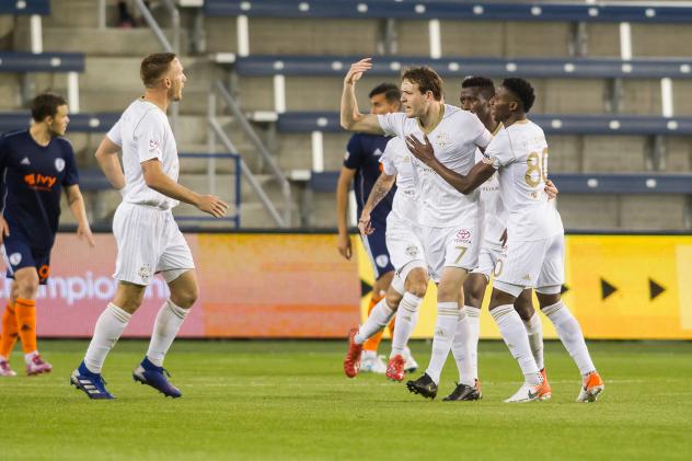 Louisville City FC celebrates a goal against the Swope Park Rangers