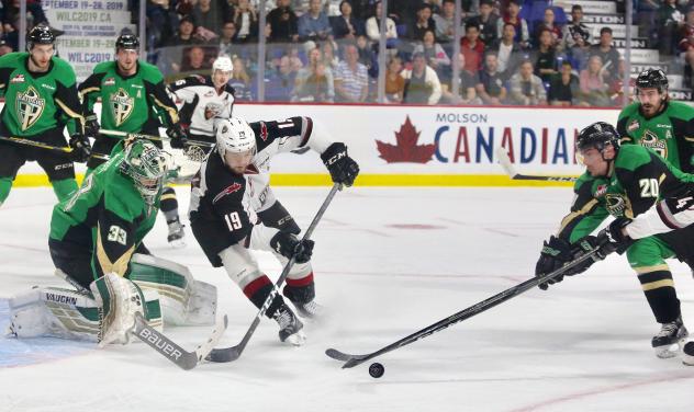 Vancouver Giants centre Dawson Holt in front of the Prince Albert Raiders goal