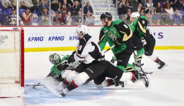 Vancouver Giants pressure Prince Albert Raiders goaltender Ian Scott