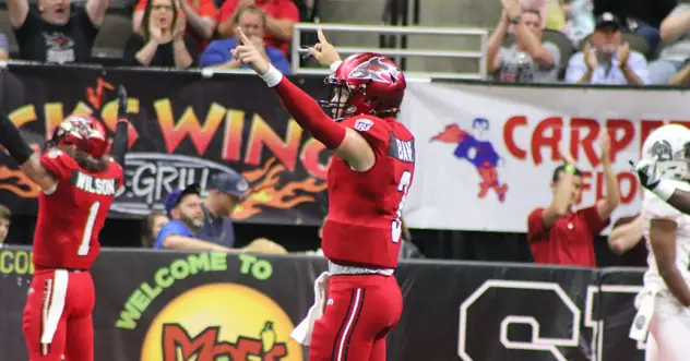 Jacksonville Sharks quarterback Jonathan Bane celebrates