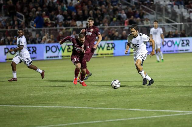 Sacramento Republic FC midfielder Ray Saari (left) races to the ball vs. Reno 1868 FC