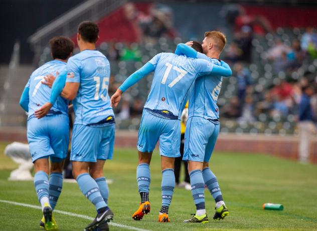 El Paso Locomotive FC celebrates a goal against New Mexico United