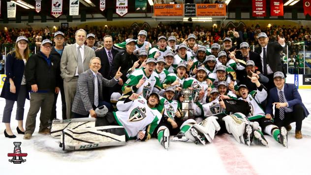 Prince Albert Raiders pose with the Ed Chynoweth Cup after winning the WHL Championship