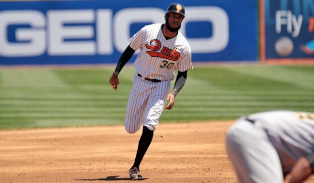 David Washington of the Long Island Ducks rounds the bases
