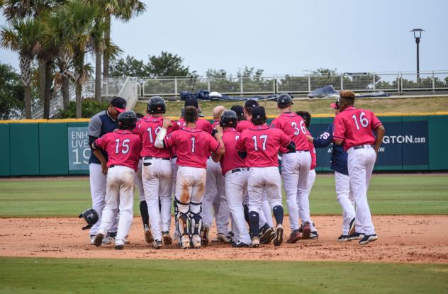 Pensacola Blue Wahoos celebrate a walk-off win