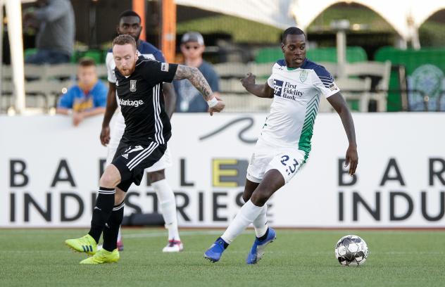 OKC Energy FC midfielder Je-Vaughn Watson (right)