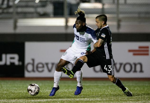 OKC Energy FC forward Omar Gordon (left)