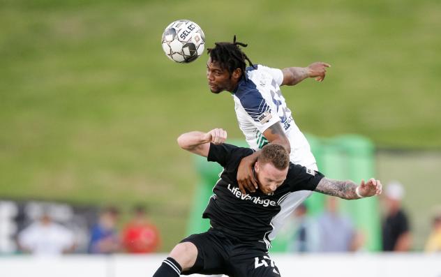 OKC Energy FC defender Mekeil Williams (top)