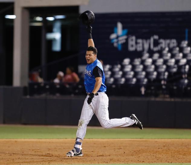 Omar Carrizales of the Tampa Tarpons celebrates around the bases