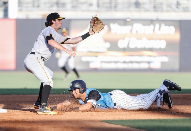 Tyler Hill of the Tampa Tarpons slides safely into second