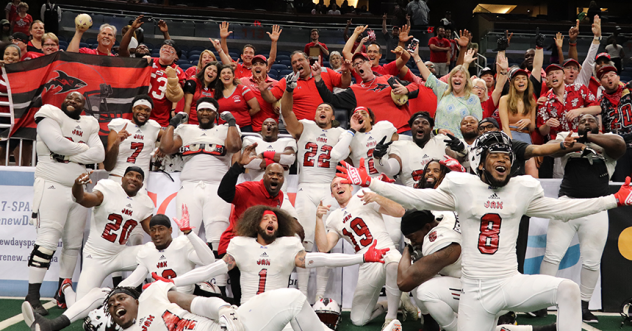 Jacksonville Sharks and their fans celebrate a win