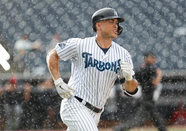 Giancarlo Stanton rounds the bases for the Tampa Tarpons