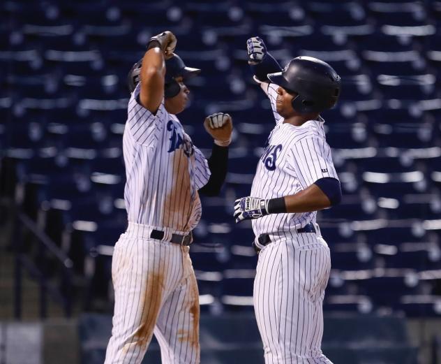 Oswaldo Cabrera and Isiah Gilliam of the Tampa Tarpons