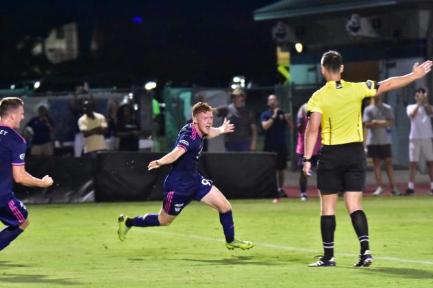 South Georgia Tormenta FC forward Mikie Rowe celebrates his goal against Orlando City B