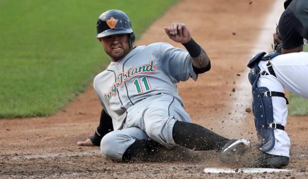 L.J. Mazzilli of the Long Island Ducks slides into home