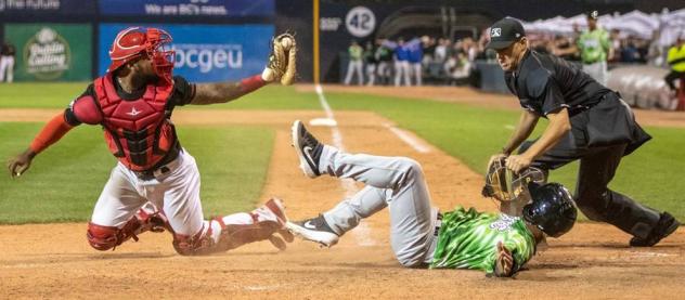 Vancouver Canadians catcher Jesus Lopez tags out a Eugene Emeralds player