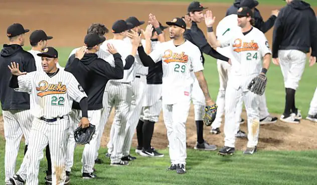 Long Island Ducks exchange high fives after a win