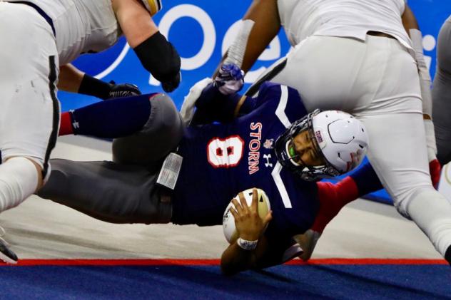 Sioux Falls Storm quarterback Lorenzo Brown dives for the endzone against the Tucson Sugar Skulls