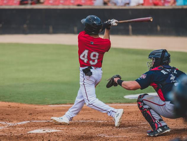 Clayton Andrews of the Carolina Mudcats takes a big swing