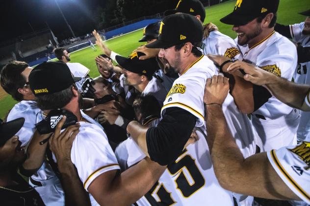 Sussex County Miners celebrate a walk-off win