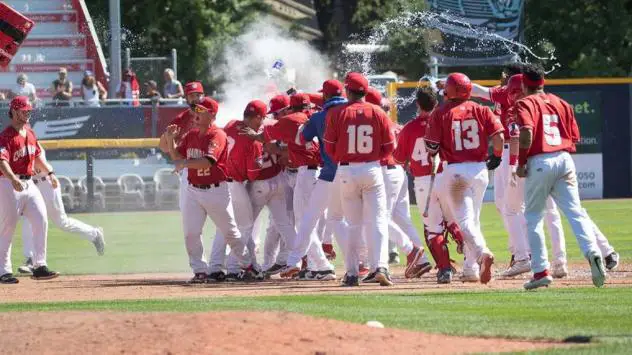 Vancouver Canadians celebrate a win