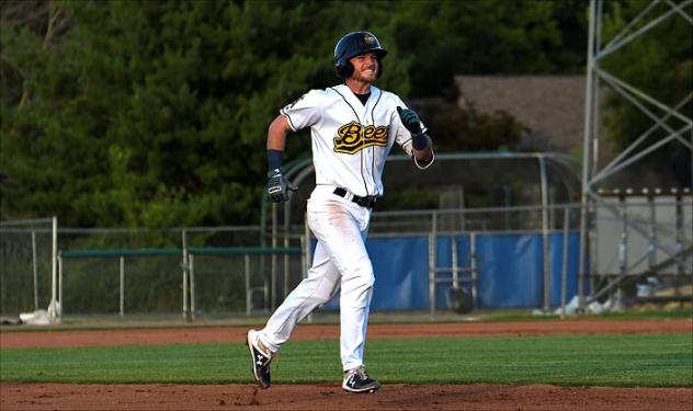 Justin Jones of the Burlington Bees rounds the bases following his home run