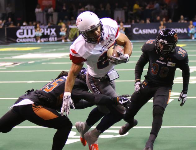 Arizona Rattlers make a tackle against the Sioux Falls Storm