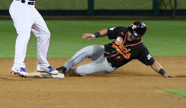 Rey Fuentes of the Long Island Ducks slides into second