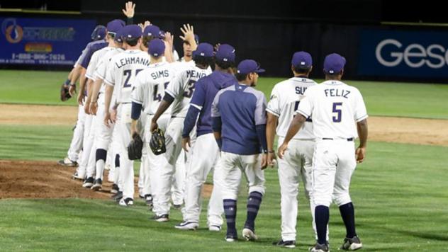 Tri-City Dust Devils celebrate a win