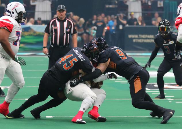 The Arizona Rattlers defense smothers a Sioux Falls Storm ballcarrier