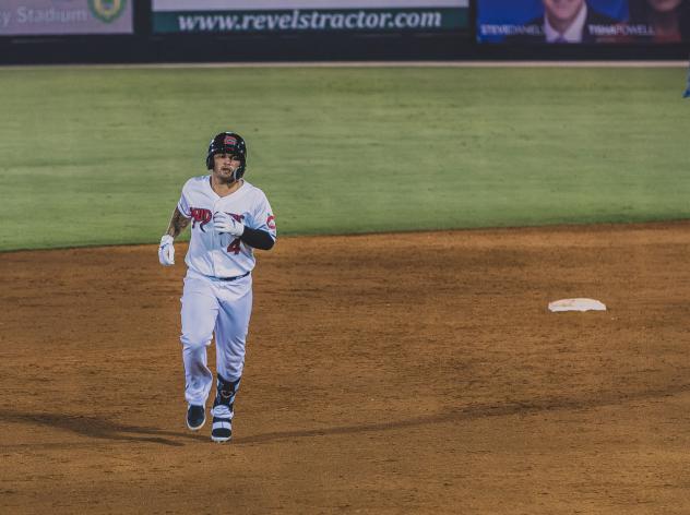 Mario Feliciano of the Carolina Mudcats rounds the bases