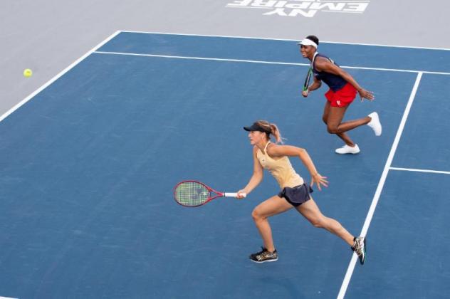Washington Kastles scramble for the ball in women's doubles