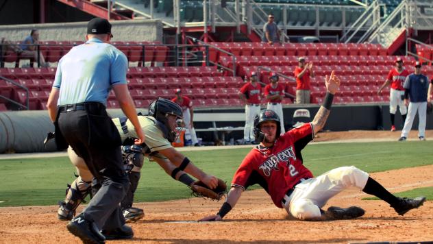 Brice Turang of the Carolina Mudcats slides safely home