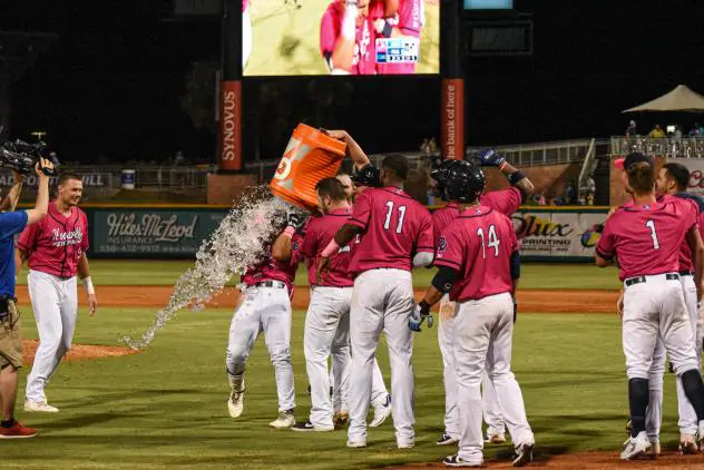 Mark Contreras of the Pensacola Blue Wahoos gets a Gatorade shower following his game-winning home run