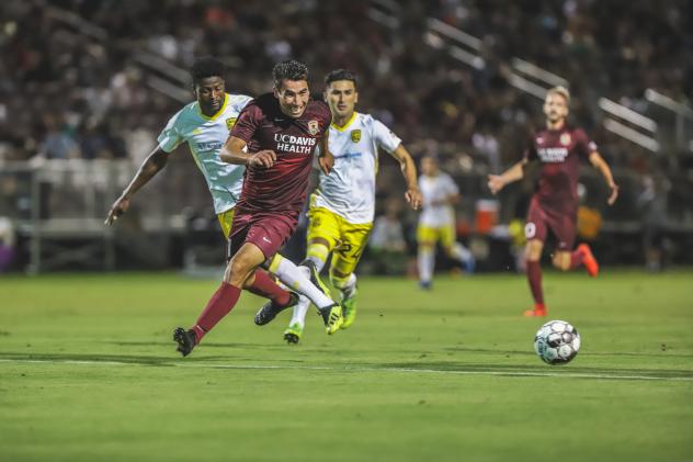 Sacramento Republic FC races to the ball against New Mexico United