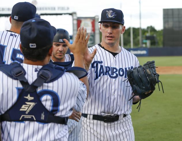 Tampa Tarpons pitcher Trevor Stephan receives high fives from his teammates